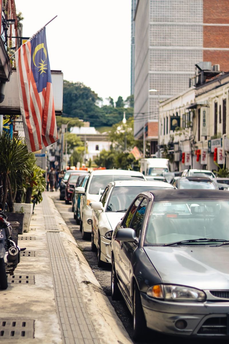 Kuala Lumpur street with the Malaysian flag